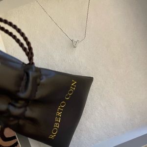 Necklace with initial “V”